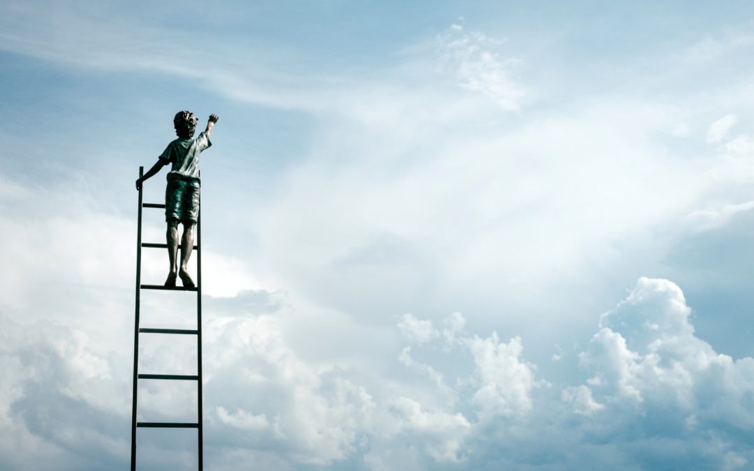 boy climbing a ladder to the clouds